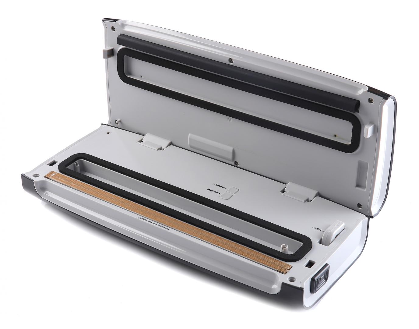 Aparat de vidat si sigilat Heinner HAV-140WH, vidare uscata/ umeda, functie marinare, sistem racire banda sigilare, furtun pentru caserole, mini-cutter incorporat, comptaibil cu pungi latime 30 cm, capacitate vidare: 7-8 l/ min, 0.6 bar, 140W, alb