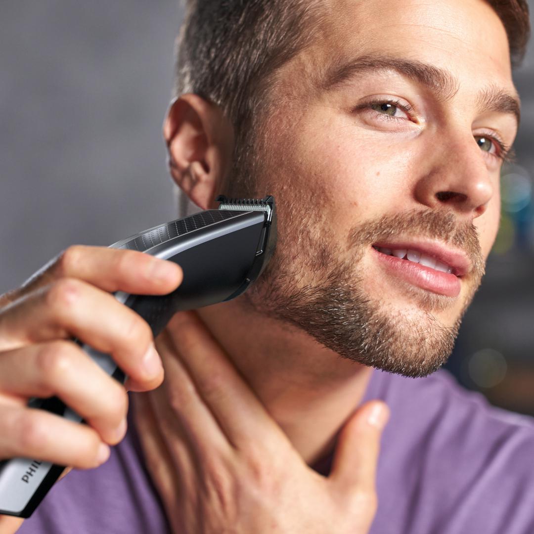 Masina de tuns PHILIPS Seria 5000 HC5630/15, 28 setari de lungime (0.5-28 mm), 90 min autonomie fara fir/nelimitat cu fir, lame din otel inoxidabil cu autoascutire, 100% rezistent la apa, tehnologie Trim-and-Flow, Argintiu