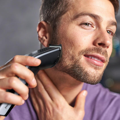 Masina de tuns PHILIPS Seria 5000 HC5630/15, 28 setari de lungime (0.5-28 mm), 90 min autonomie fara fir/nelimitat cu fir, lame din otel inoxidabil cu autoascutire, 100% rezistent la apa, tehnologie Trim-and-Flow, Argintiu